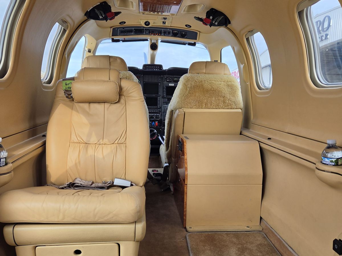 Cabin of TBM 700C2 N6272B looking forward down the aisle toward the flight deck